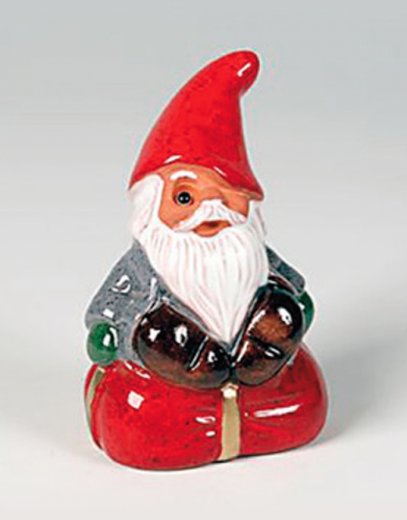 Rolf Berg Mikrotomte sitter på rött paket 7 cm